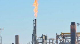 Gas flares from a stack in Utah's Uintah Basin, Feb 15, 2013.