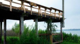 Water sits 30 or more feet below the base of a fishing pier at Lake Corpus Christi on April 28.