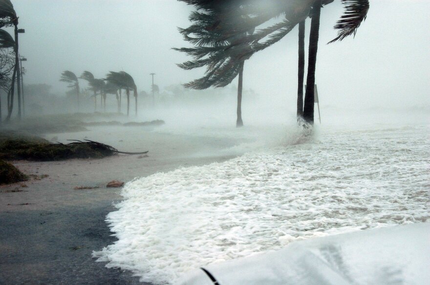 A hurricane hitting a coastline.