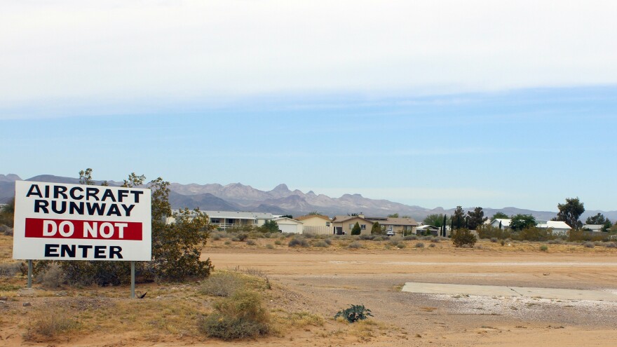 Cal-Nev-Ari is known as a fly-in town. Lots of residents here are retired pilots who taxi their small planes from their homes to the mile-long dirt airstrip, which spans the length of the town.