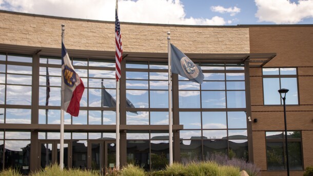 The Utah, United States and U.S. Department of Homeland Security flags fly outside Salt Lake City Immigration Court in West Valley City, July 6, 2026.