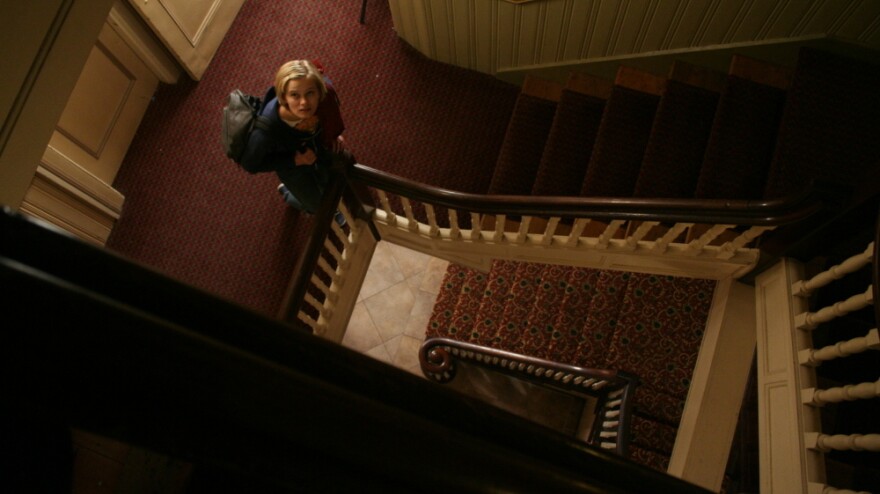 Claire (Sara Paxton), a 20-something desk clerk at an old New England inn, decides to investigate whether the hotel is haunted in director Ti West's latest film, <em>The Innkeepers</em>.