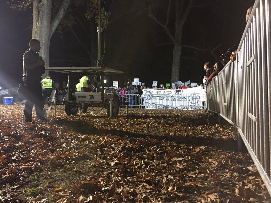 Police guard the pedestal where the Silent Sam statue once stood on UNC's campus during a protest on Dec. 3, 2018.