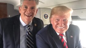 U.S. Rep. Darin LaHood, left, with President Trump on Monday aboard Air Force One.