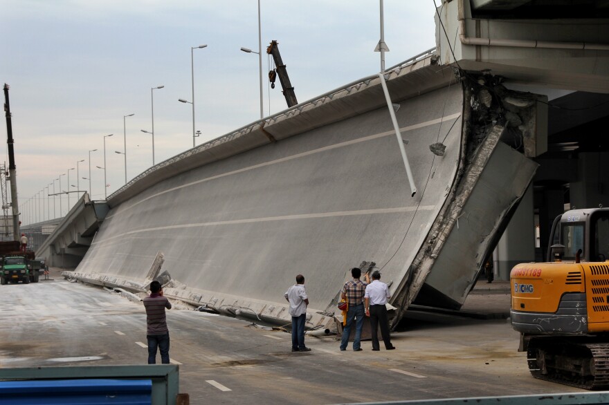 Eight bridges have collapsed around China since 2011. Here, government investigators examine a recently built entrance ramp that collapsed this summer in the northeastern city of Harbin, killing three people. Local residents believe government corruption and substandard materials are to blame.