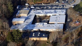 Sandy Hook Elementary School in Newtown, Conn., is shown last Dec. 14, when a gunman killed 20 children and six adults. The building is now being destroyed; a new school will be built on the site.