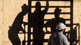 File photo of construction workers at a work site.