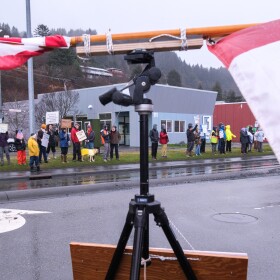 Protesters hung several flags like these two of the U.S. and Canada's flags flown together to show friendship with the neighboring country. Despite the long-standing alliance, President Trump ordered Canadian goods to be tariffed earlier this year.