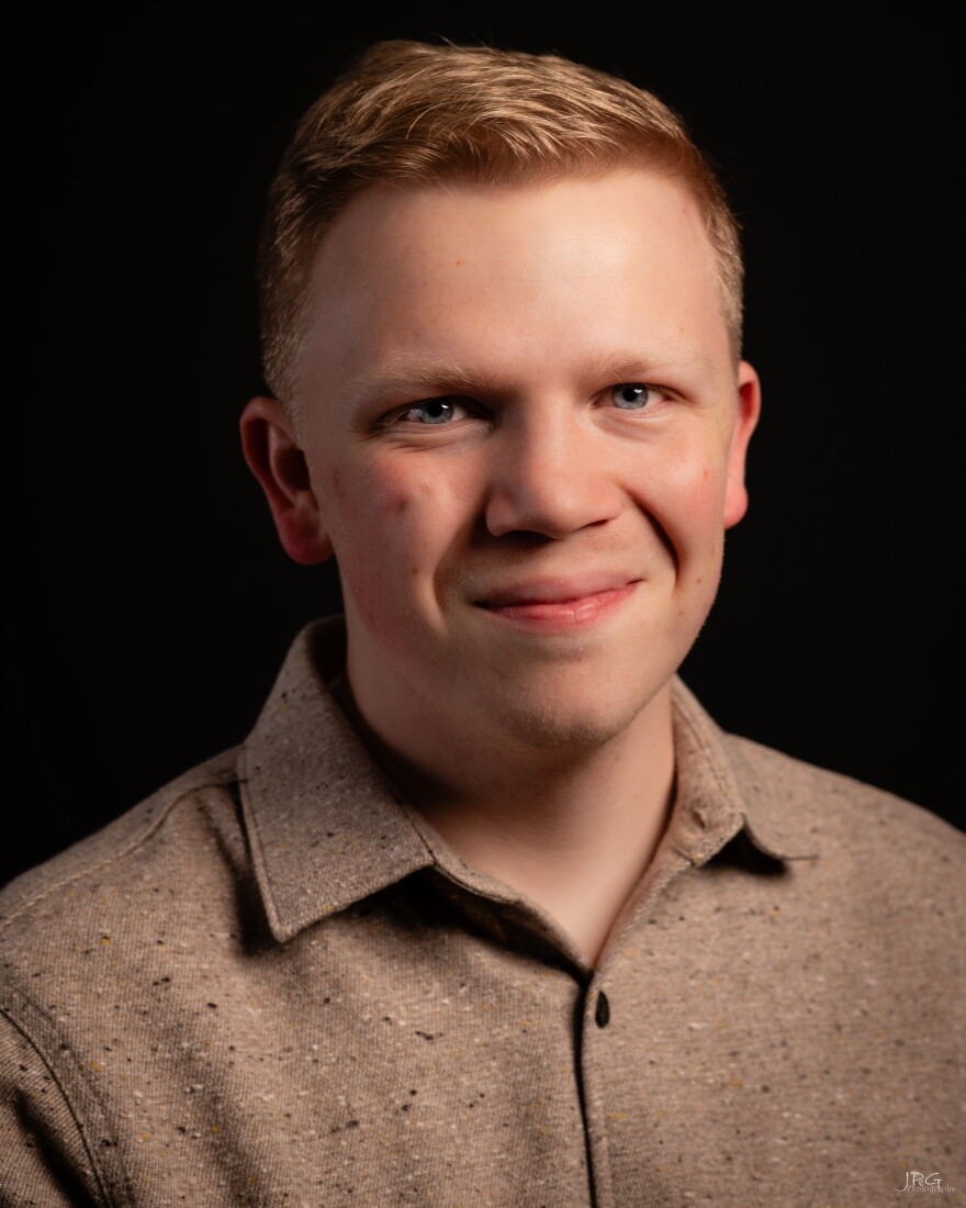 A man's profile photo.