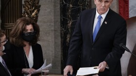 Senate parliamentarian Elizabeth MacDonough works beside then-Vice President Mike Pence earlier this year during the certification of 2020 Electoral College ballots, in the House chamber of the U.S. Capitol.