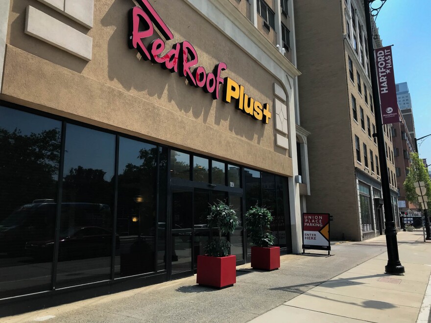 Two of Connecticut's 21 evacuee families enrolled in the Federal Emergency Management Agency's Transitional Shelter Assistance program live at the Red Roof Inn Plus in downtown Hartford. At the height of the program, nearly 40 families were placed here.