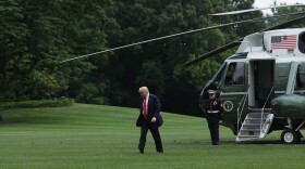 President Trump walks toward the White House after landing on the South Lawn on June 16, 2017, in Washington. (Alex Wong/Getty Images)