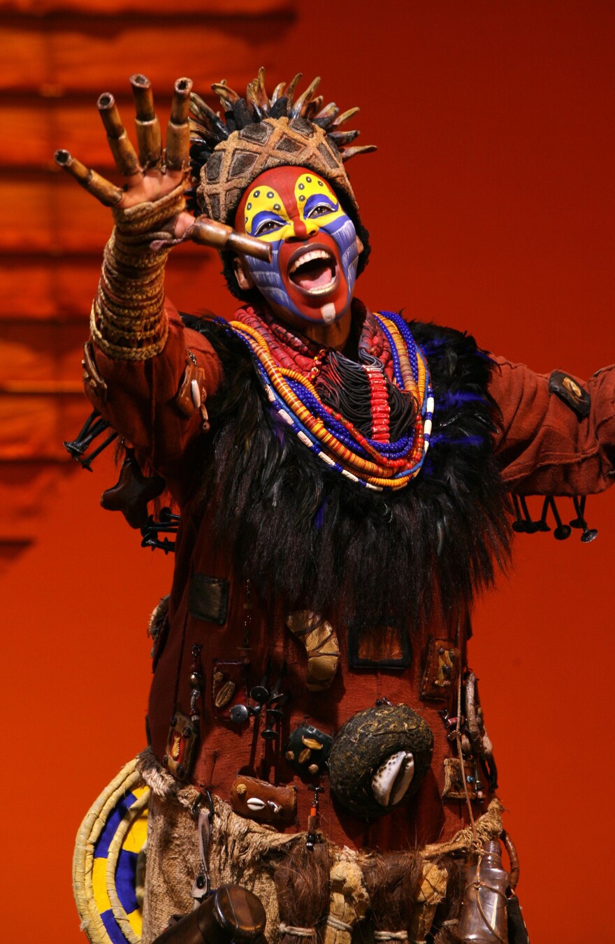 Tshidi Manye performs as Rafiki.