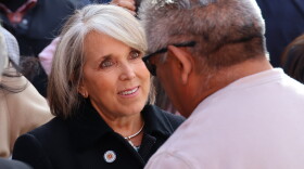 Governor Michelle Lujan Grisham speaking with a citizen after the conclusion of the press conference