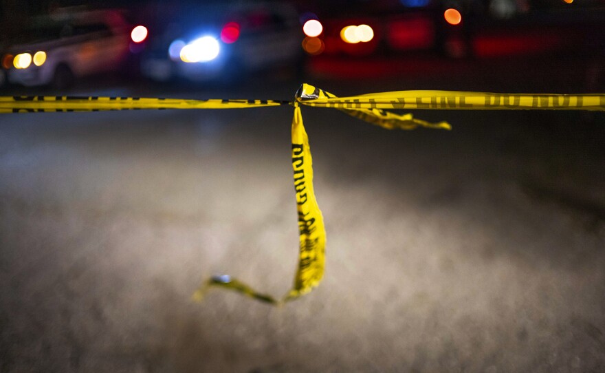 Police tape from the San Mateo Country Sheriffs office mark the parameter of the scene of a shooting at two agricultural businesses in Half Moon Bay, Calif., on Tuesday.