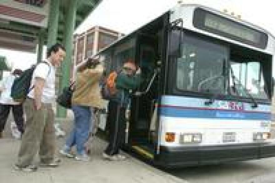 Passengers boarding a SARTA bus in Canton