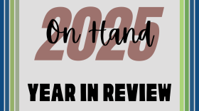 A graphic with the text “2025” in large rainbow numbers across the center. Overlaid in black script is the phrase “On Hand.” Below, in bold black block letters, it reads “Year in Review.” The background is light gray with vertical stripes of green and blue along the left and right edges.
