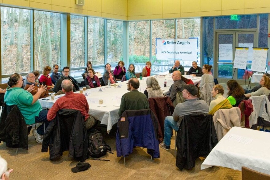 Better Angels members hold political discussions at a workshop last December.  The organization's president David Blankenhorn said the group uses tactful conversation to dive into opposing political values.