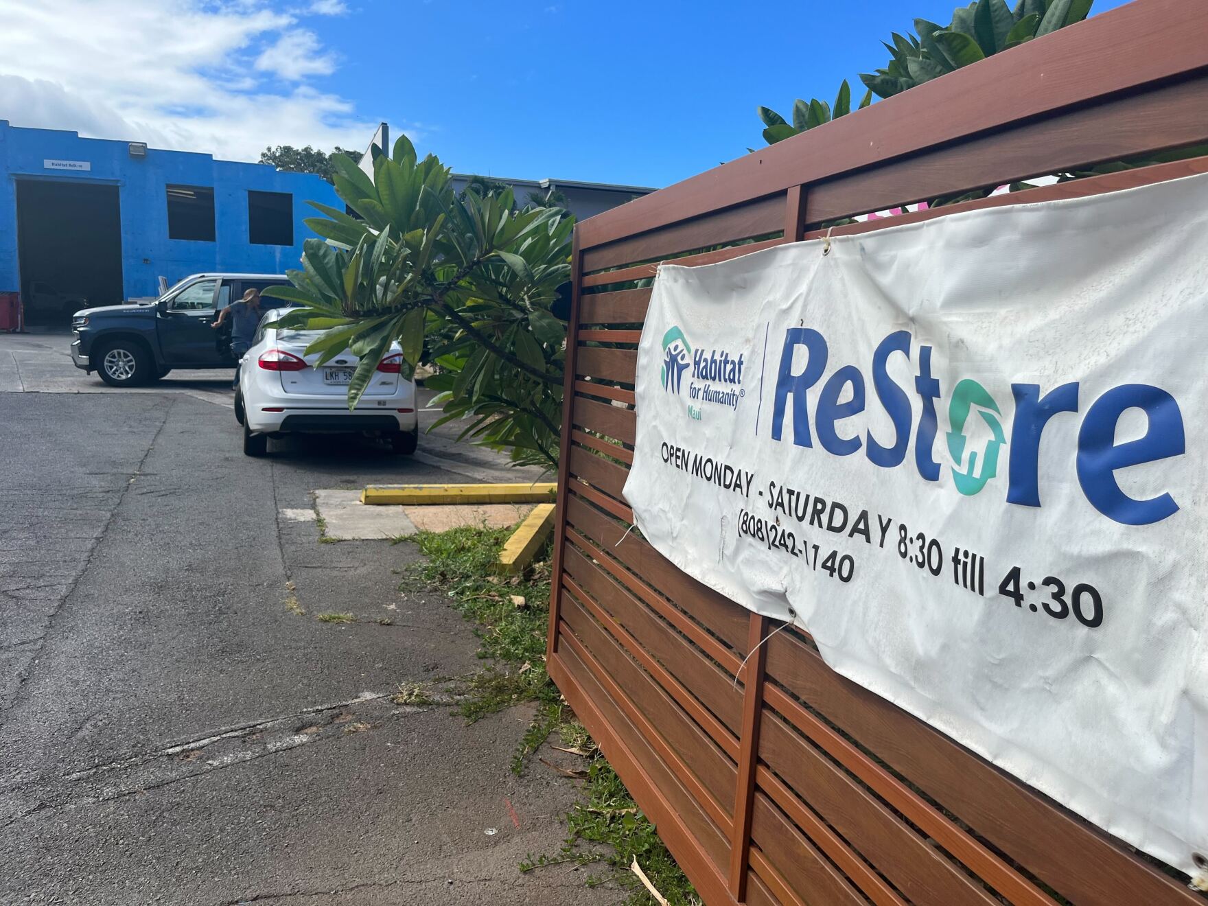 Habitat for Humanity crews collect donations while they wait to rebuild