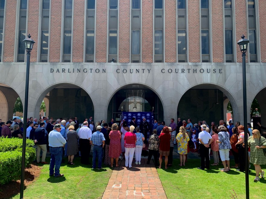 Gov. Henry McMaster speaks outside of the Darlington County Courthouse ahead of long serving Clerk of Court Scott Suggs’ announcement that he switched to the Republican Party on June 30, 2021.