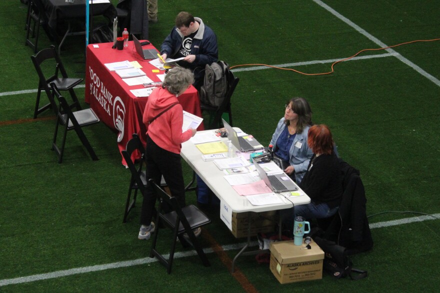 Representatives from the state's public assistance office participate in Project Homeless Connect on Tuesday, Jan. 27, 2026 in Soldotna, Alaska.