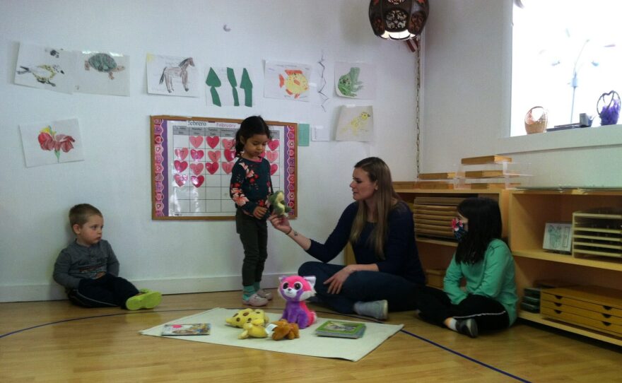 A teacher at Vista Montessori School in Boise interacts with children at the center. (courtesy of Melissa Buck)