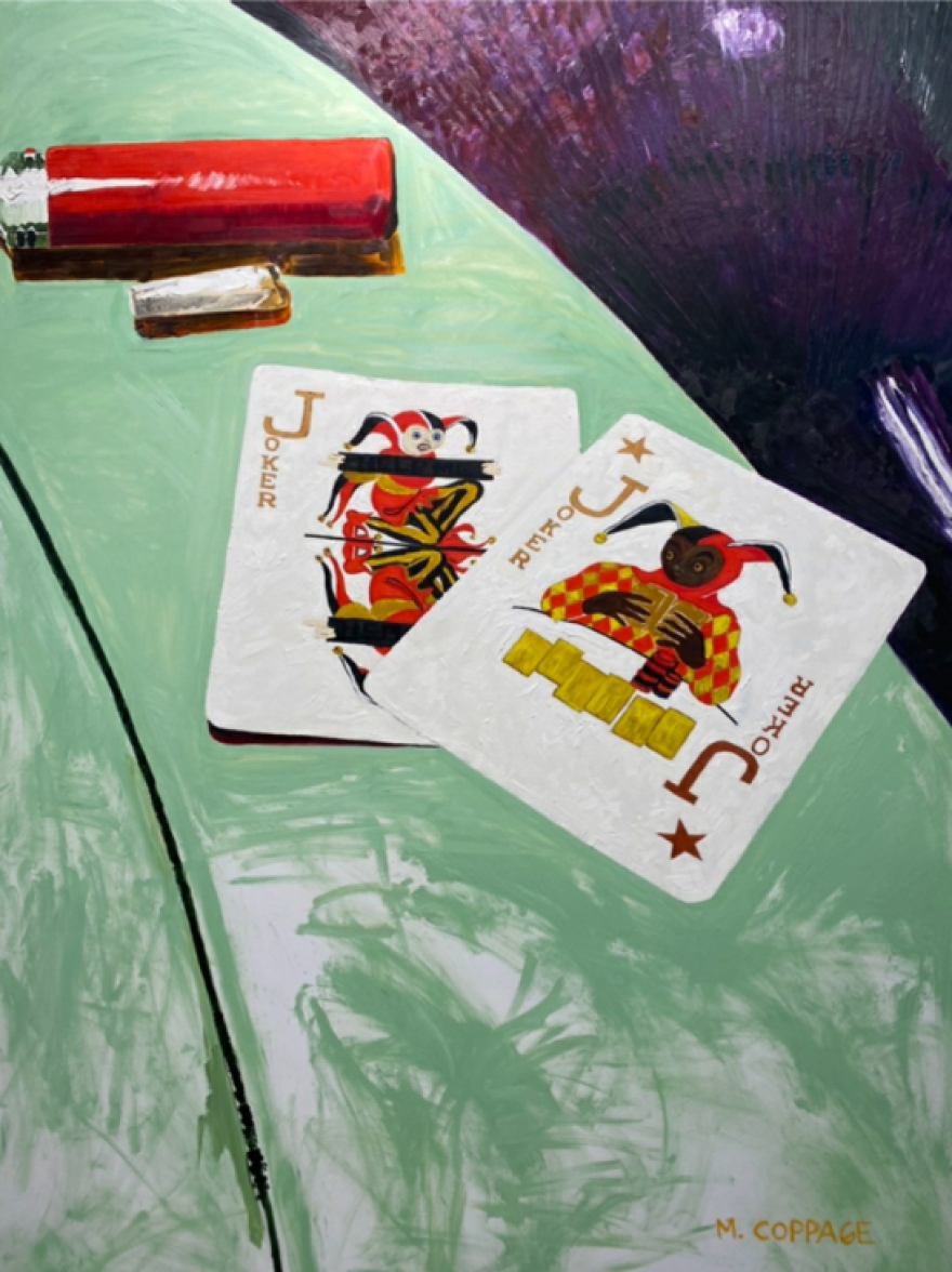 Two jokes sit on a card table.