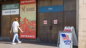 A voter enters a polling location at the National World War I Museum to submit a ballot for the August 2022 primary election.