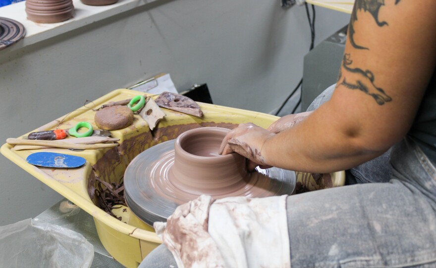 JaiDe Brown leads a cermanics demonstration during a recent class at City Arts in downtown Wichita.