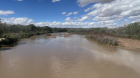 The Rio Grande flows just north of the Central Avenue bridge in Albuquerque on Oct. 13, 2026.