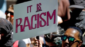 People protest against President Trump in San Francisco.