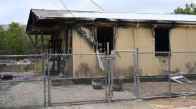 Pictured: Fire investigators are working to determine the cause of a fire that destroyed the Williams Delight home of slain Executive Security Officer Eustace Charles late Thursday night.