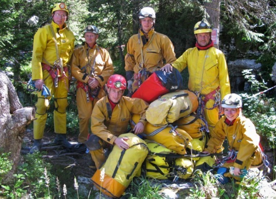 Photographer Robbie Shone (front, red helmet) is seen with his team at the Gouffre Berger in 2010. Also pictured from left: Tim Nixon, Bob Toogood, Mark Richardson, Mark Wright and Gina Moseley.