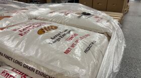Stacked bags of rice at the Palm Beach County Food Bank in Lake Worth Beach on Nov. 3, 2025, as local officials spread information on food resources following the lapse in SNAP benefits.