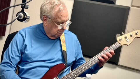 William B. Hart playing bass guitar in NPR Illinois Studio F