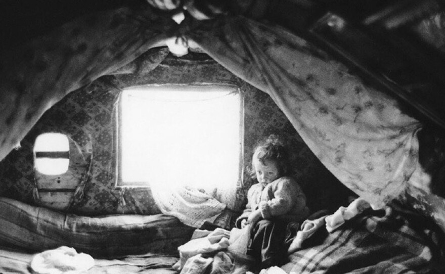 Infant in a caravan, Navan