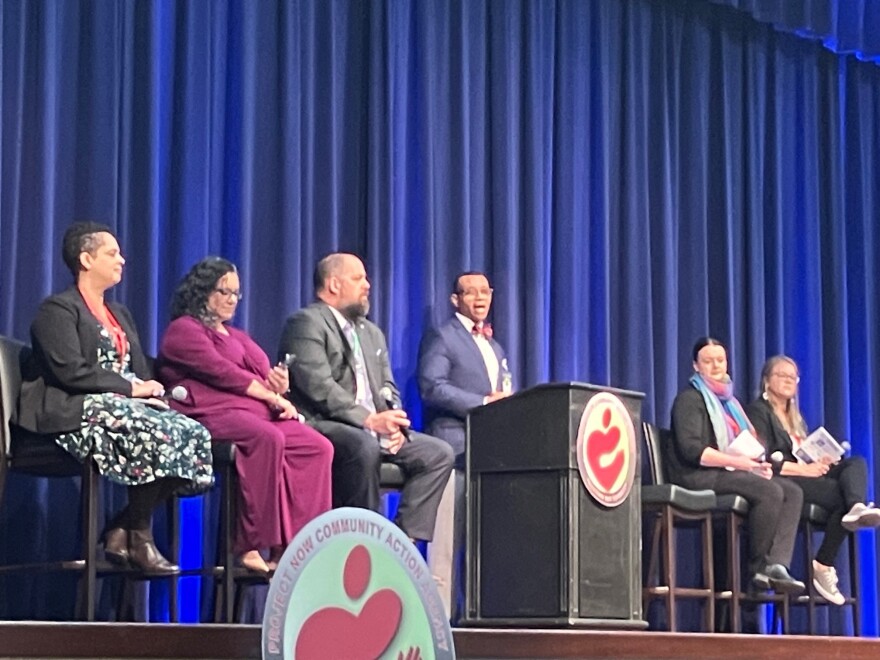 Project NOW executive director Rev. Dwight Ford (center) speaks during a panel discussion on homelessness Thursday, April 9, featuring (L-R) Christine Haley, Sangeetha Rayapati, Ron Lund, Christie Adamson and Annika O'Melia.