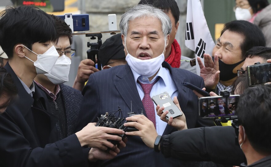 Sarang Jeil Church pastor Jun Kwang-hun speaks outside a detention center in Uiwang, South Korea, in April. Jun tested positive for the coronavirus last month, two days after he took part in an anti-government rally in Seoul.