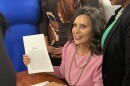 Governor Gretchen Whitmer signed the new Michigan school aid budget surrounded by teachers, students, and legislators at a school in Southfield on Tuesday, July 21, 2026.
