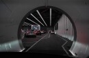Teslas park in the Las Vegas Convention Center Loop, an underground tunnel developed by Elon Musk's The Boring Company, Tuesday, June 8, 2021, in Las Vegas. The systems twin tunnels beneath the Convention Center began providing rides for conventioneers in a fleet of Teslas on Tuesday. (AP Photo/John Locher)