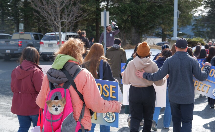 Rebecca Shields, the executive director of KWRCC, brought along her dog for the Choose Respect March on Wednesday.
