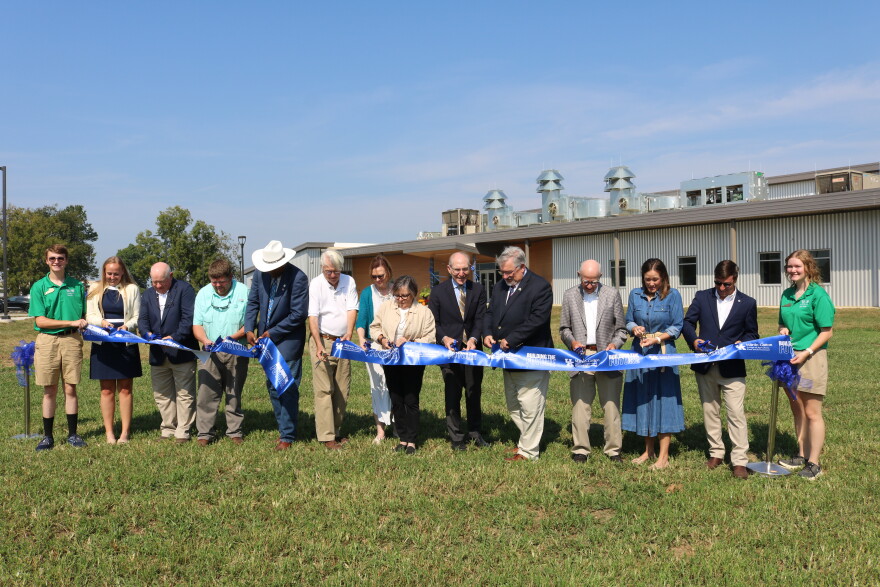 University of Kentucky and state leaders, including Kentucky Department of Agriculture Deputy Commissioner Warren Beeler, Kentucky Livestock Coalition President Caleb Ragland, Kentucky District 22 Senator Donald Douglas, UK President Eli Capilouto, Kentucky District 56 Representative Daniel Fister, Emeritus Professor William Moody and Lieutenant Governor Jacqueline Coleman, celebrate the opening of the Meats and Foods Industry Advancement Center on September 16, 2026. The facility will provide new meat science education opportunities and open a new market for Kentucky-grown products.