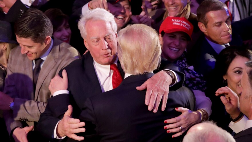 Republican president-elect Donald Trump hugs his brother Robert Trump after delivering his acceptance speech at the New York Hilton Midtown in the early morning hours of Nov. 9, 2016, in New York City.