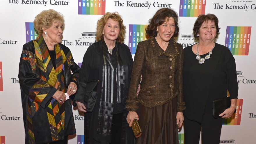 Actress Lily Tomlin (second from right) poses with wife writer Jane Wagner (second from left) and friends Elaine Barbour (left) and Vivian Schneider before the 2014 Kennedy Center Honors in Washington.