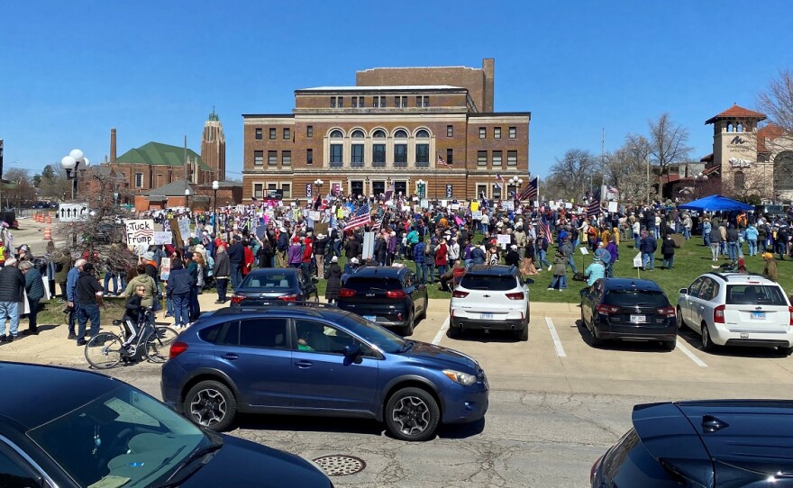 In Bloomington, protestors filled the lawn outside the Bloomington Center for the Performing Arts, with an overflow gathering south of the lawn and across East Street.