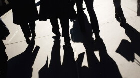 Businessmen and shoppers walk along Madison Avenue on Nov. 1, 2011 in New York City. (Spencer Platt/Getty Images)