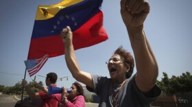A woman chants anti-government slogans in a walkout against President Nicolas Maduro, in Maracaibo, Venezuela, Wednesday, Jan. 30, 2019. (Boris Vergara/AP)