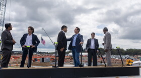 Gov. Jeff Landry talks with Hut 8 CEO Asher Genoot at the groundbreaking of the company’s West Bend data center in West Feliciana Parish, Louisiana, on Monday, October 5, 2026.