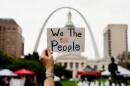 Thousands march in downtown St. Louis to protest the Trump administration’s agenda during the “No Kings” protest on Saturday, June 14, 2025.