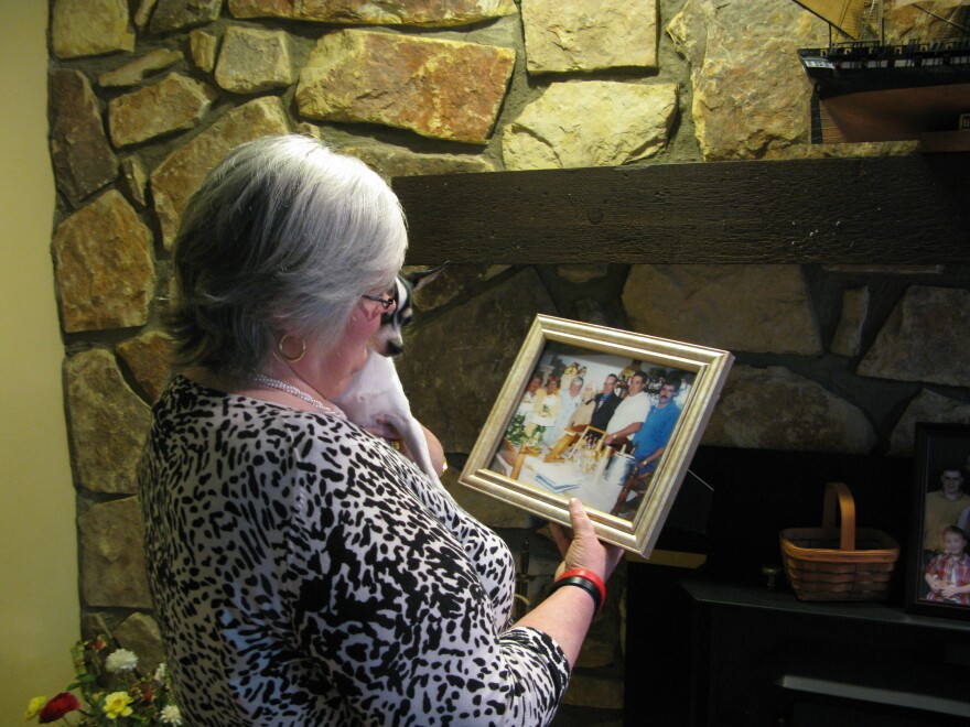 Judy Jones Petersen with a treasured photo of her family. After the Upper Big Branch mine blast, she had to wait four days to learn the fate of her brother.
